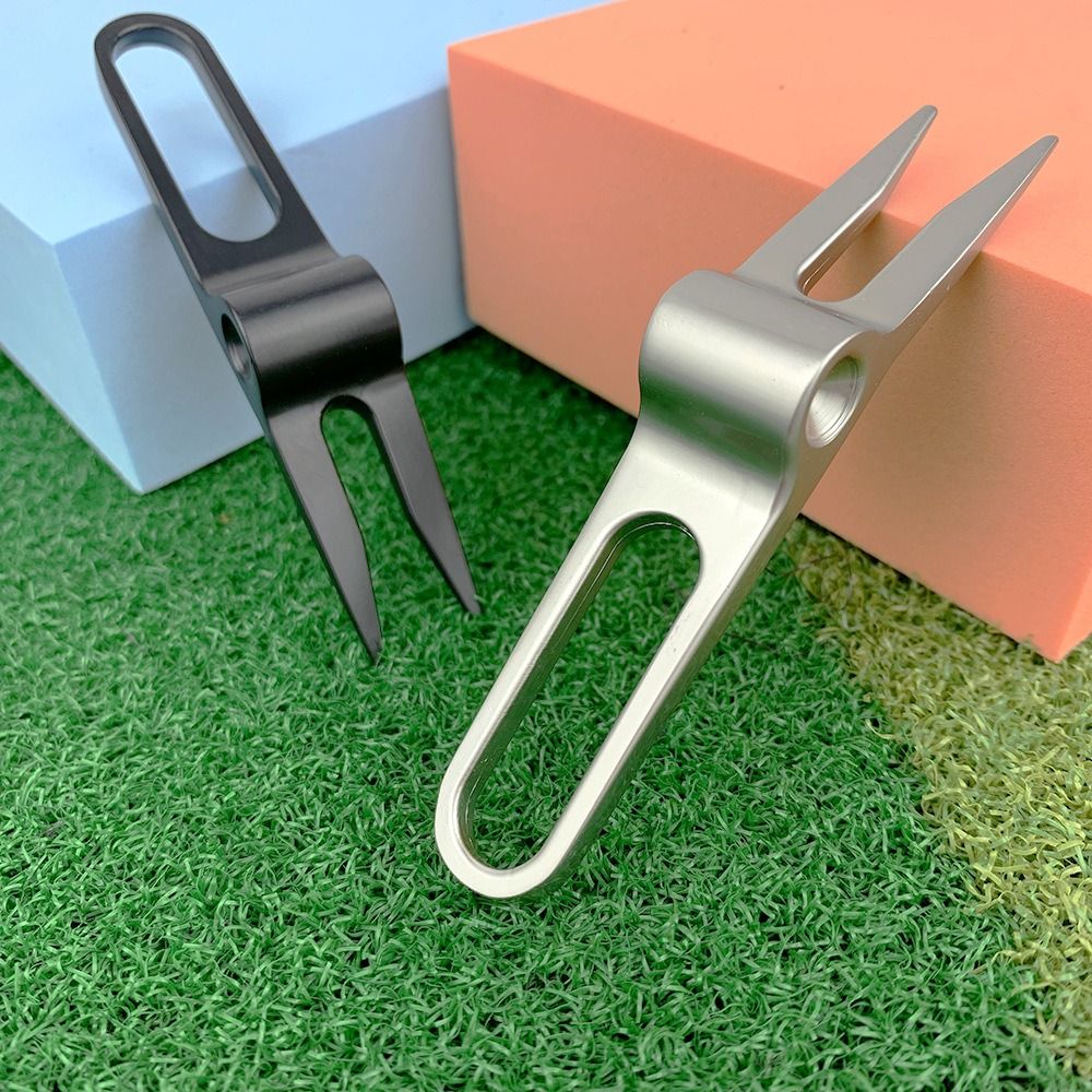 أداة إصلاح عيوب العشب في ملعب  - مراجعة Divot Repair Tool وسعره